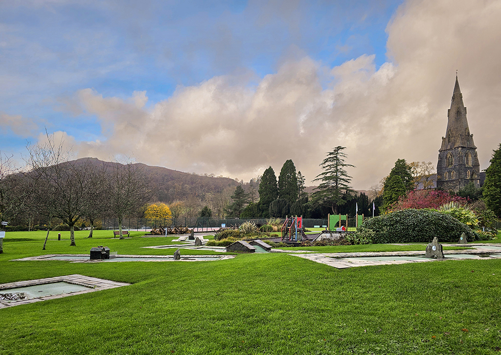 White Platts Recreation Ground, Ambleside. On the right is the spire of St Mary's Church, and in the distance is Loughrigg Fell.