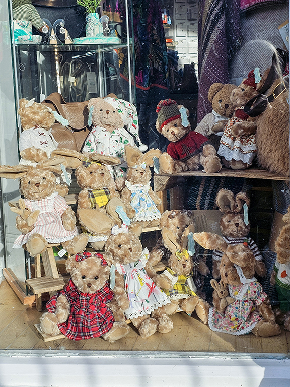 A display of teddy bears (and bunnies) in an Ambleside window.