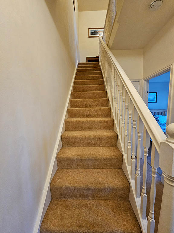 Royal Oak, Keswick, stairs to the upper floor of the apartment.