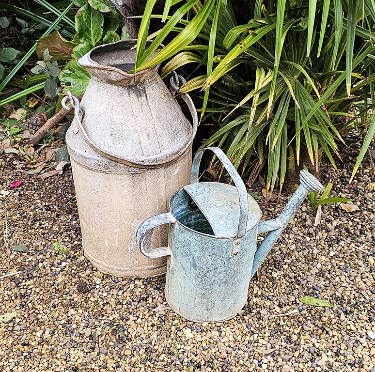 watering can and old milk churn